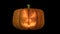 3d animated carved pumpkin halloween EVIL face with candle light animation loop