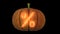 3d animated carved pumpkin halloween text typeface with candle light animation loop percent