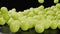 3d animation green grapes tumbling towards the viewer