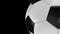 3D animation of a textured soccer ball rolling in place.