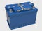 3D blue car battery with handles and gray terminals on white