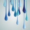 3D blue glossy paint drop blobs