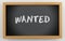 3d chalkboard with Wanted text