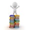 3D Character sitting on top of stack of books with arms raised