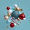 3d Christmas ornaments levitating. Red blue white glass balls, candy cane, golden stars isolated on blue background. Arrangement