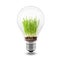 3d close up image of green grass inside a light bulb