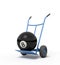 3d close-up rendering of black bowling ball on blue hand truck.