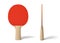3d close-up rendering of ping pong racket with wooden handle and red rubber on white background.