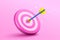 3d dart hit to center of dartboard with pink background. minimal cartoon illustration.