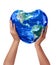 3d earth heart in hands