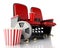 3d Film reel, popcorn and Cinema clapper board on theater seat.