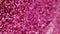 3D glittering pink slow wave motion vertical background video.