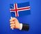 3d hand holding Iceland National flag