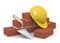 3d illustration brick wall with trowel and hard hat