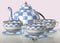 3d illustration of china checkered teakettle porcelain te cup spoon on glass table in pink kitchen with day light imitation