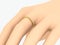 3D illustration closeup yellow gold diamond eternity ring on han