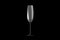 3D illustration of flute champagne glass isolated on black side view - drinking glass render