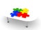 3D Illustration of four colorful matching puzzle pieces on a tab