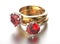 3D illustration gold ring with garnet gemstone. Jewelry background. Fashion accessory