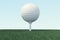 3D illustration Golf ball and ball in grass, close up view on tee ready to be shot. Golf ball on sky background.