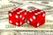 3d illustration: high quality rendering of transparent two red dices with white dots lie on the background of green 100 dollar mon