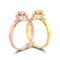 3D illustration isolated two yellow and rose gold halo bezel pave diamond rings with shadow