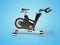 3d illustration of modern exercise bike upright for sports side view on blue background with shadow