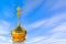 3d illustration: onion dome of the Orthodox Church with a dollar symbol instead of a cross - crucifix on a stone base with cracks.