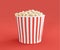 3D Illustration. Popcorn in red white striped bucket