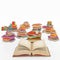 3D illustration rendering  cartoon of   many multi colored vintage books