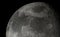 3D Illustration Rendering. Earth`s Full Moon Glowing On Black starfield Background. Crisium Sea