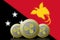 3D ILLUSTRATION Three RIPPLE cryptocurrency with Papua New Guinea flag on background
