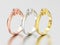 3D illustration three yellow, rose and white gold or silver three stone diamond rings