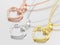 3D illustration three yellow and rosr gold and silver diamond he