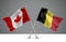 3D illustration of Two Crossed Flags of Canada and Belgium