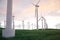 3d illustration, wind turbine with sunset sky. Energy and electricity. Alternative energy, eco or green generators