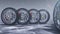 3d illustration Winter tires on a with falling snow background of snow storm, snowfall and slippery winter road. Winter