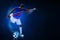 3d illustration young professional soccer player kicking ball on dark blue backgrounds