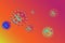 3D image of coronavirus, gradient shades of orange and pink