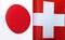 3D image fragments of national flags of Japan and Switzerland