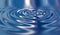 3D liquid ripples or VFX blue shiny waves substance with a metallic reflection on surface. Texture, movement and motion