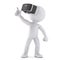 3D man with VR glasses pointing at invisible object. 3D illustration. Isolated