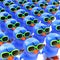 3d A mass of bluebirds wearing green sunglasses