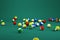 3d models of small billiard balls on a green isolated background. Billiard balls in a variety of ways. Lots of billiard