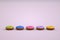 3D objects of colorful donuts on an isolated white background. Isometric models of multicolored donuts. Confectionery