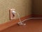 3D outlets with plug, energy power consumption concept.Plastic double socket and wire, european safe jack and cable. Realistic