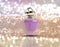 3D perfume bottle on glitter background