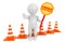 3d person with Under Construction banner and traffic cones