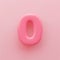3D Pink number null or zero with a glossy surface on a pink background.