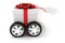 3d present box with red bow on wheels